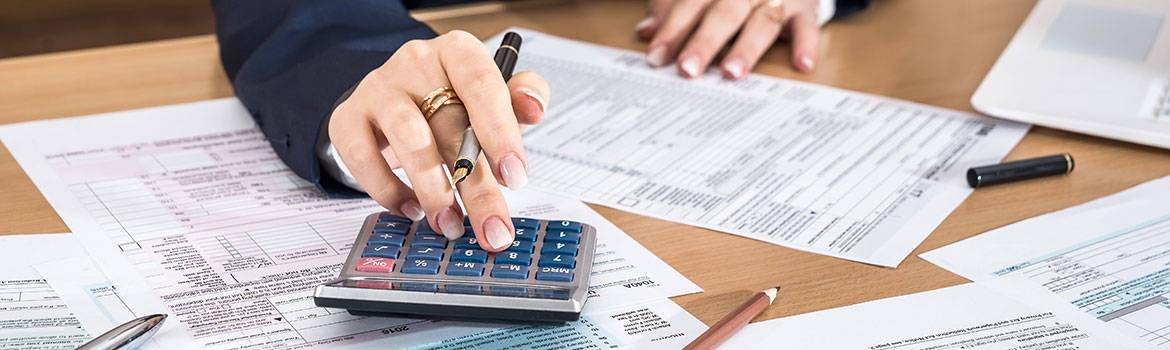 bookkeeping ledger laptop